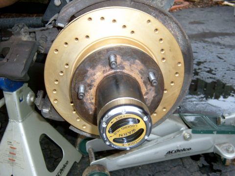 1995 Ford Bronco - Put the cap on and tighten down all 6 screws, make sure it is set to “free” before you put it on.