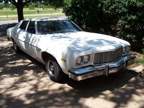 1976 Ford Torino - This 1976 Ford Torino sedan is seen from a 3q-front angle, parked outdoors.