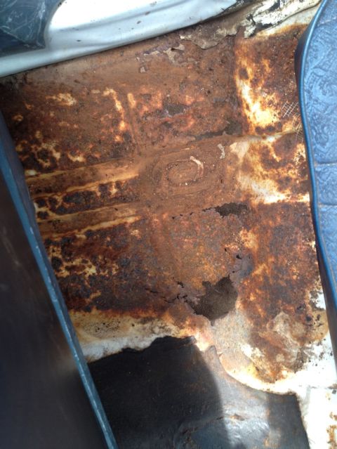 1976 Ford Torino - floorboard rust caused by leaky roof rail weatherstripping