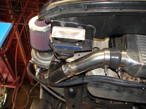 1992 Ford Taurus - Custom turbocharger and intercooler piping installation shown.