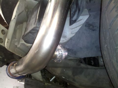 1992 Ford Taurus - Custom exhaust piping and blow-off valve installation detail.