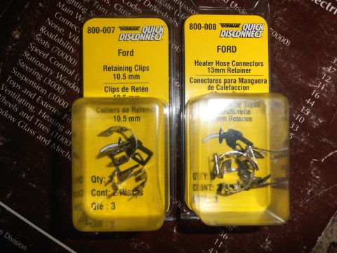 1990 Ford Bronco - Two Dorman Quick Disconnect retainer packages in yellow blister packs: part 800-007 'Ford Retaining Clips 10.5 mm' and part 800-008 'Ford H…