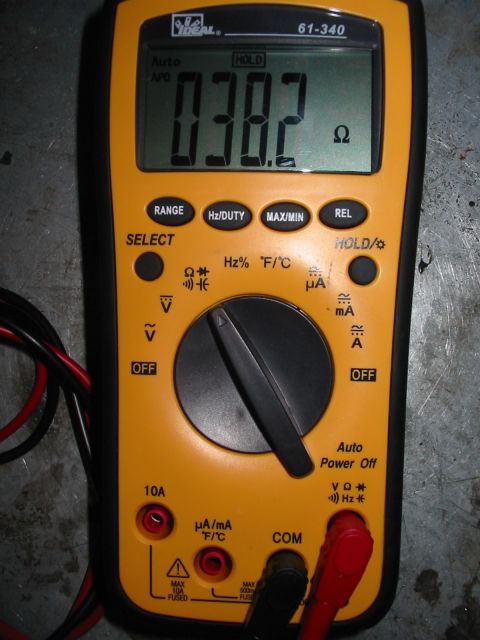 1992 Ford Bronco - A digital multimeter shows a resistance reading of 0.382 ohms.