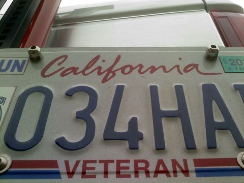 1996 Ford Bronco - Close-up of a California license plate with the word VETERAN visible below the plate number.
