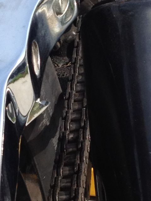 1995 Ford Bronco - A close-up view shows a chain drive mechanism adjacent to a black tire, with a watermark for Supermotors.net visible.