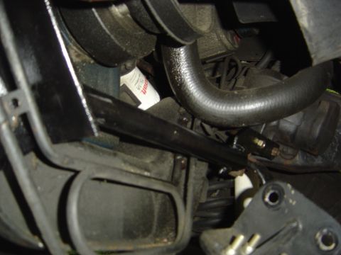 1986 Ford Bronco - Engine bay components, including hoses and a filter, are visible in this close-up shot.