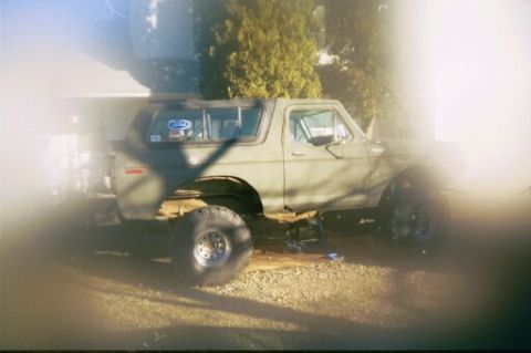 1979 Ford Bronco - Side view of a 1978 Ford Bronco, likely modified for off-road use.