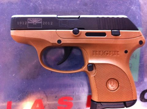1987 Suzuki Samurai - Ruger LC9 pistol with anniversary markings on the slide.