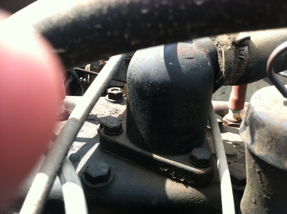 close-up of engine part with numbers GPW 3250 stamped on it