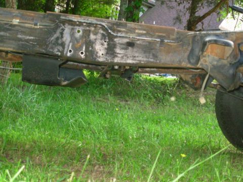1983 Ford Bronco - Test-fitting a '90 M5OD-R2 4WD crossmember; it fits perfectly in the front location.