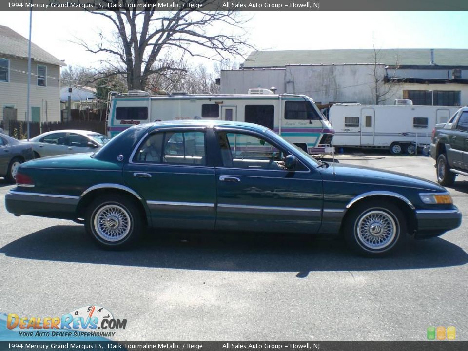 1994 Mercury Grand Marquis LS, dark green, side view, parked outdoors