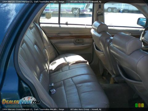1994 Mercury Grand Marquis - Rear interior view of a 1994 Mercury Grand Marquis LS, showing the leather seats and door panel details.