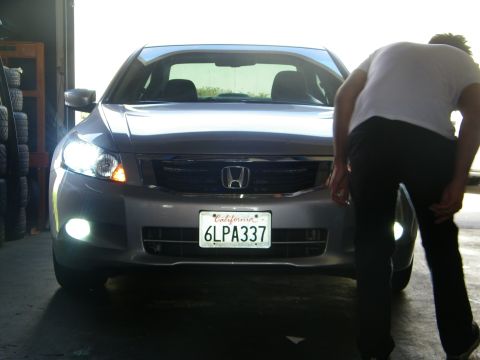 2010 Honda Accord - Silver Honda Accord, front view, with California plate 6LPA337. A person is visible in the foreground.