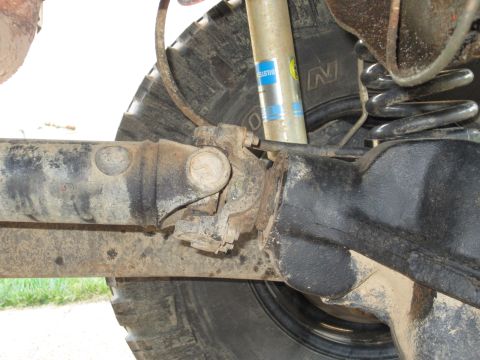 1992 Ford Bronco - Close-up of the rear suspension and driveshaft of a 1992 Ford Bronco.