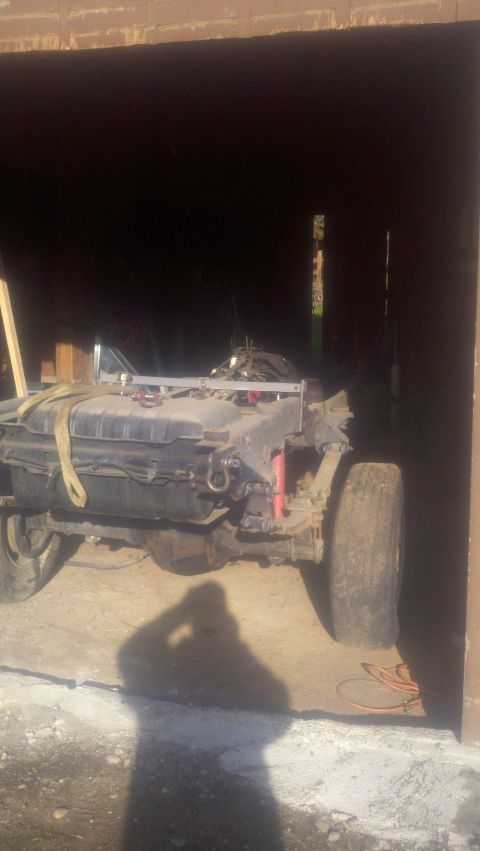 1988 Ford Bronco - The rear section of a vehicle chassis, including the fuel tank and suspension components, is visible.