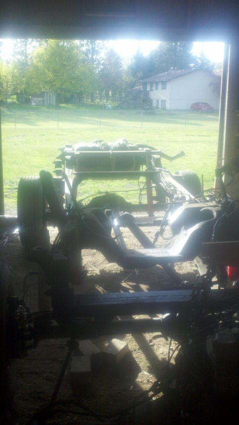 1988 Ford Bronco - This appears to be a vehicle frame and suspension system, possibly undergoing restoration or repair.