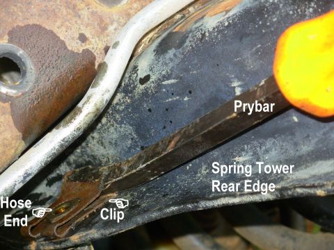 1983 Ford Bronco - Brake Hose Clip Removal The clip can't be removed until the brake line & inverted flare nut are gone. Pry the clip up and off; two prybars…