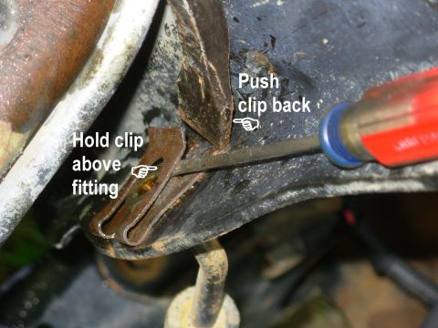 1983 Ford Bronco - Brake Hose Clip Removal The clip can't be removed until the brake line & inverted flare nut are gone. Pry the clip up and off; two prybars…