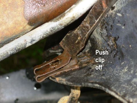 1983 Ford Bronco - Brake Hose Clip Removal The clip can't be removed until the brake line & inverted flare nut are gone. Pry the clip up and off; two prybars…