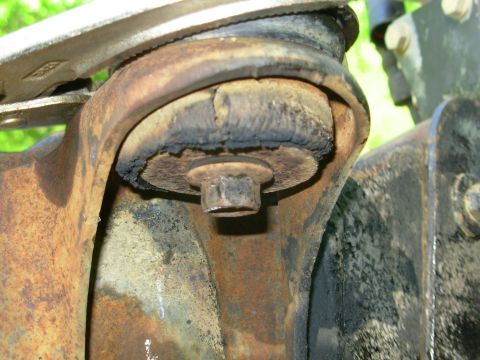 1983 Ford Bronco - With the top washer held by the large-jaw Vise Grip 12L3 , it's easy to concentrate on the bolt. I started working it back & forth VERY sli…