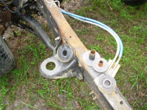 1983 Ford Bronco - The other body mounts are much simpler to remove. Simply back out the bolt until no threads are showing below the nut, then strike the bolt…
