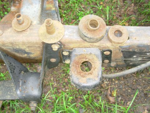 1983 Ford Bronco - The other body mounts are much simpler to remove. Simply back out the bolt until no threads are showing below the nut, then strike the bolt…