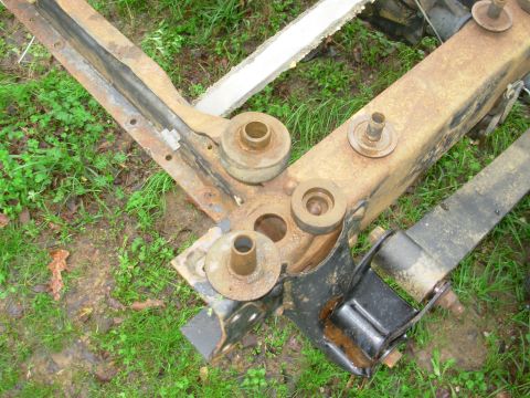 1983 Ford Bronco - The other body mounts are much simpler to remove. Simply back out the bolt until no threads are showing below the nut, then strike the bolt…