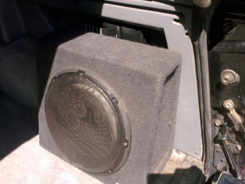 1994 Ford Bronco - Mmm bass. Amp is inside the trim pocket. Sub is Velcro'd to the trim.