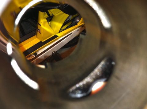 1981 Garelli Rally Sport - Interior view of a yellow motorcycle, seen through a metal tube.