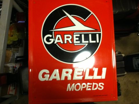 1981 Garelli Rally Sport - A red sign displays the Garelli logo and the words "GARELLI MOPEDS".