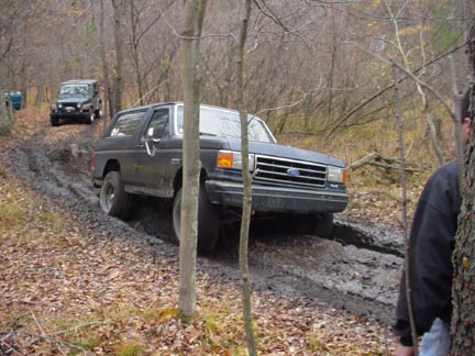 1989 Ford Bronco - Here I am making my first pass through the first mud hole. Wasn't bad, hit hard going in, made it through just fine.....bigger trucks were…