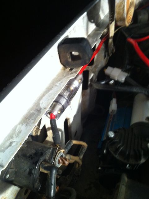 1996 Ford Bronco - Fuse on the main feed wire to the auxiliary fuse box.