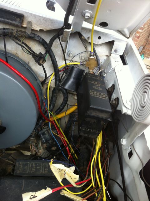 1996 Ford Bronco - auxiliary fuse box, took it from a taurus. Mounted with bolts and clip on nuts (simliar to nuts used to hold on top) The bolts and nuts are…