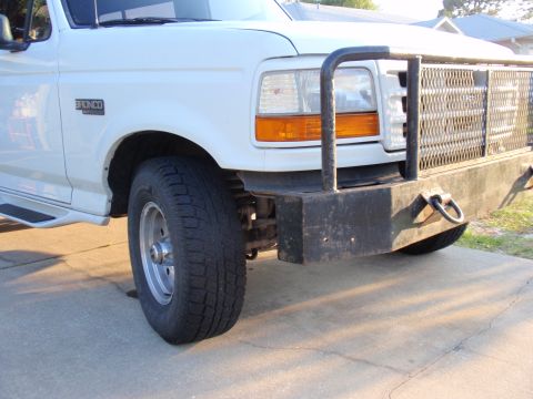 1995 Ford Bronco - Front view of a 1995 Ford Bronco showing its distinctive grille and heavy-duty bumper.