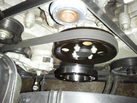 2007 Ford Crown Victoria - Engine belt pulleys and serpentine belt shown in detail.