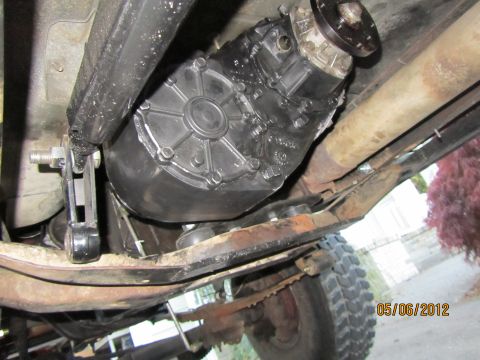 1984 Ford Bronco - The underside of a vehicle reveals a transfer case and exhaust system, with a date stamp of 05/06/2012.