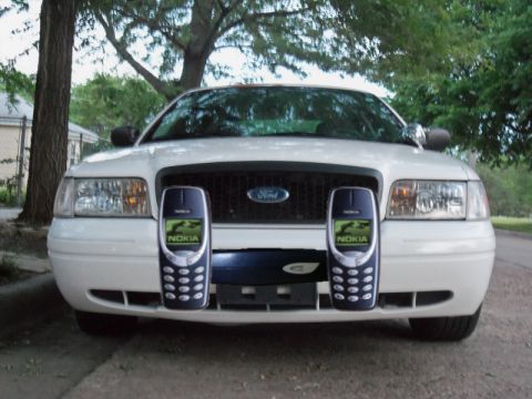 2000 Mercury Grand Marquis - Ford Crown Victoria front view with Nokia phones mounted on the grille.