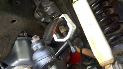 1978 Ford Bronco - Tool used for removing tie rod ends from vehicle suspension system.