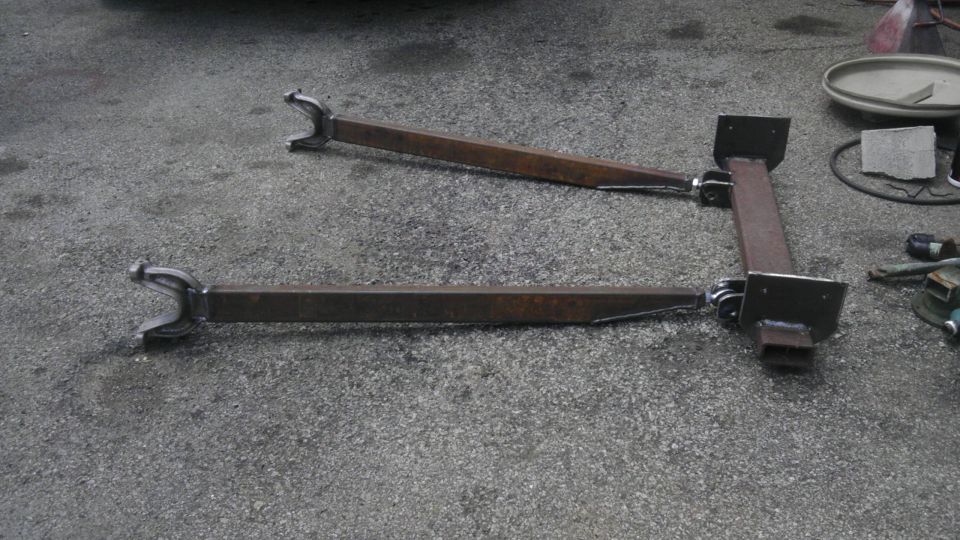 Custom front suspension components with C-shaped ends and square tubing