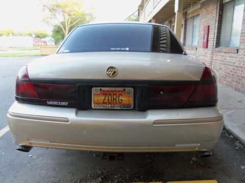 2000 Mercury Grand Marquis - The rear of a silver 2000 Mercury Grand Marquis is shown, displaying its license plate.