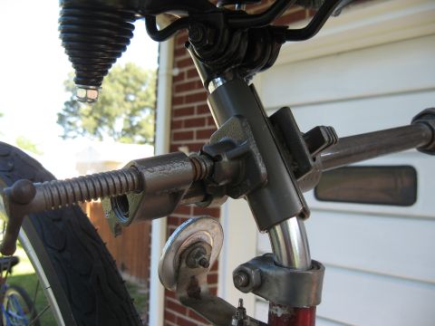 1994 Ford Bronco - Close-up view of a bicycle's seat post clamp assembly, showing mechanical components.