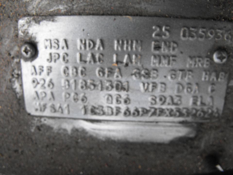 Stamped vehicle data certification label with VIN and option codes