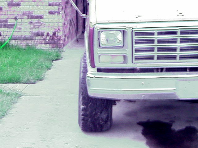 1980 Ford Bronco front corner with grille and headlight visible