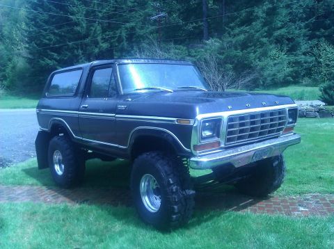 1979 Ford Bronco - This lifted 1979 Ford Bronco features a prominent chrome grille and aggressive off-road tires.