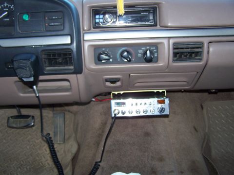 1992 Ford Bronco - Interior view of a 1992 Ford Bronco, a CB radio and microphone mounted on the dash.