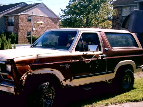 1980 Ford Bronco - This 1980 Ford Bronco is seen from the side, showing its two-tone paint and condition.