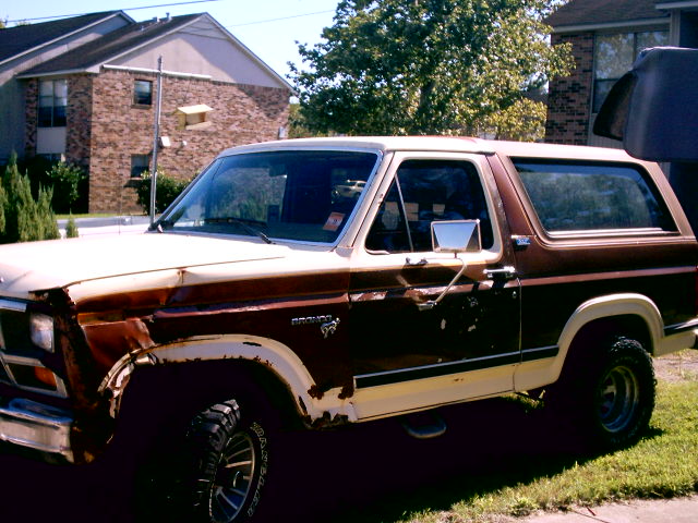Brown and white 1980 Ford Bronco side view