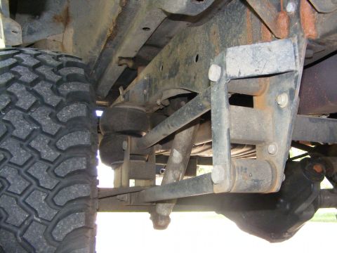 1978 Ford Bronco - Undercarriage detail with air suspension components visible.