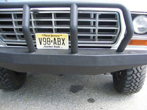 1978 Ford Bronco - Front view of a 1978 Ford Bronco, its grille, bull bar, and a New Jersey license plate.