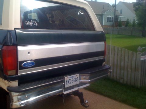 1992 Ford Bronco - Rear view of a 1992 Ford Bronco, showing the tailgate and bumper.
